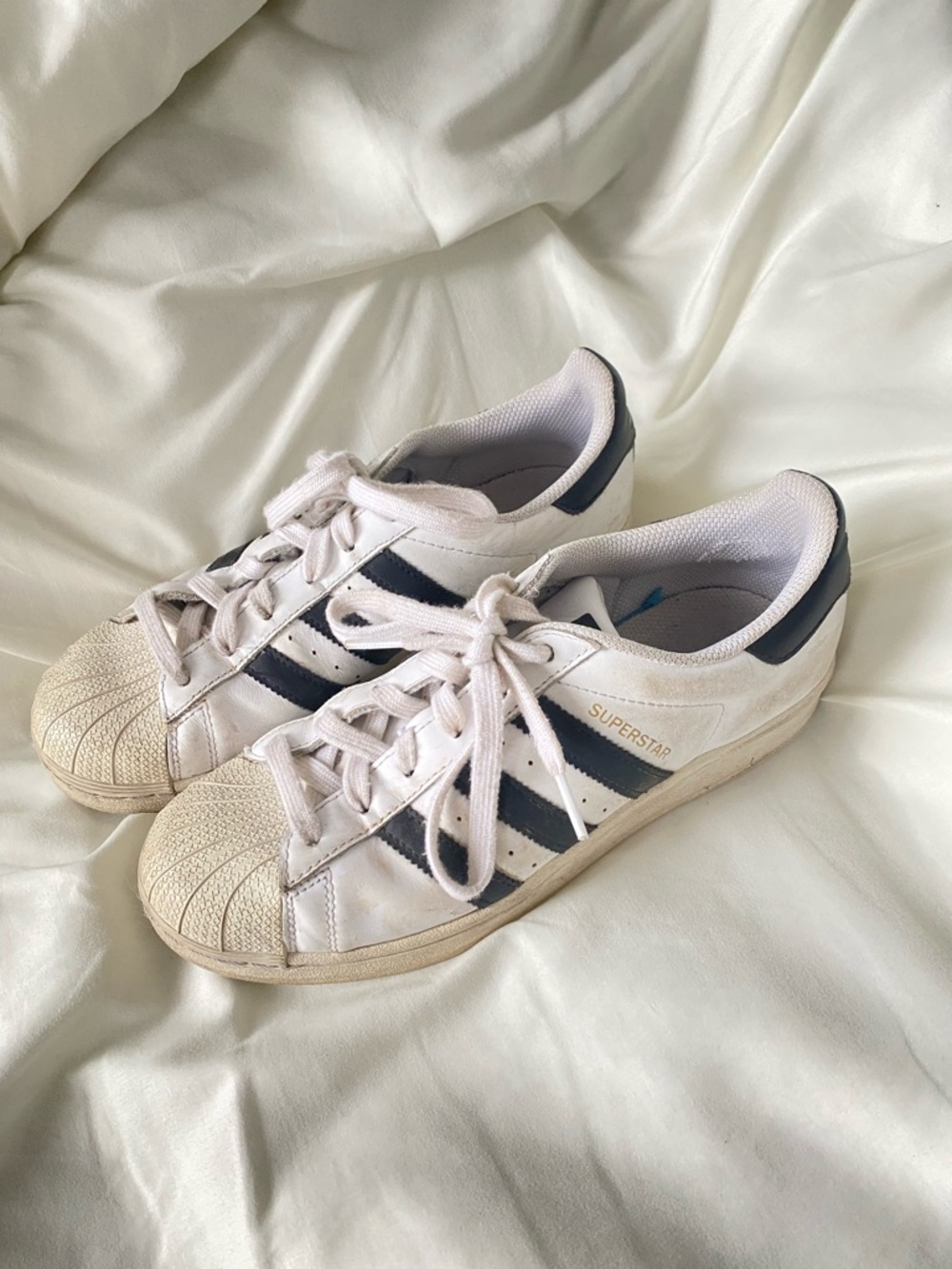 adidas White Sneakers with Black Stripes and Gold Accent